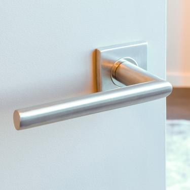 Ragusa door handle stainless steel with square rosette