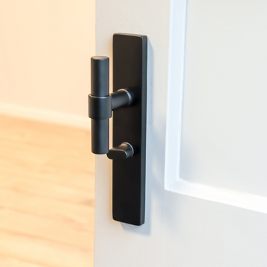 Pesaro door handle black with rectangular shield WC63/8 bathroom lock