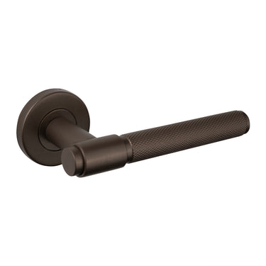 Cosenza door handle Knurled bronze with round rose