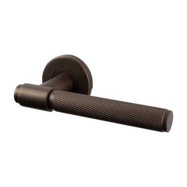 Cosenza door handle Knurled bronze with round rose