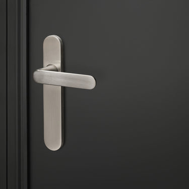 Novara door handle stainless steel with rounded shield