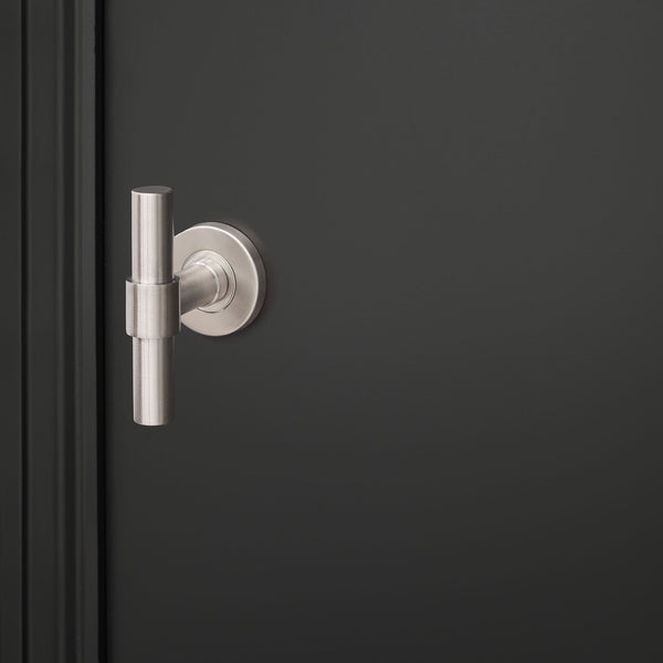 Pesaro door handle stainless steel with round rosette