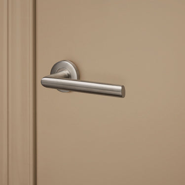 Ragusa door handle stainless steel with round rosette