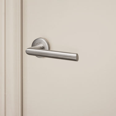 Ragusa door handle stainless steel with round rosette