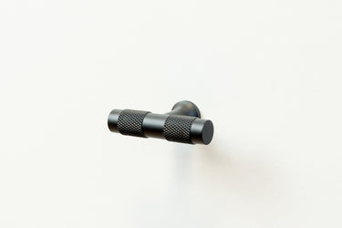 Cabinet knob T-model Ribbed black 50 mm