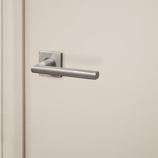 Teramo door handle stainless steel with square rosette